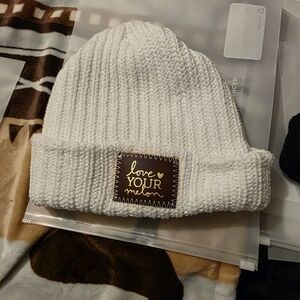 Love Your Melon Cream Ribbed Cuffed Beanie with Brown Patch